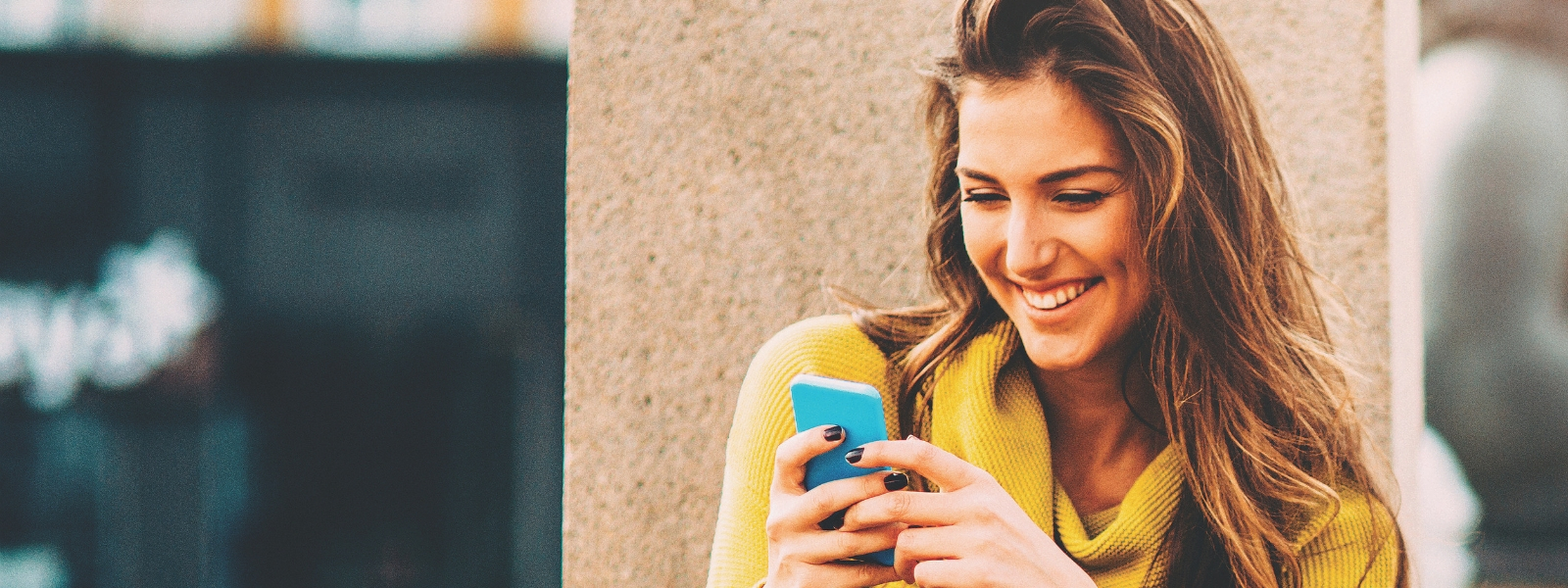 woman holding a smartphone Contacting Fair Lakes
